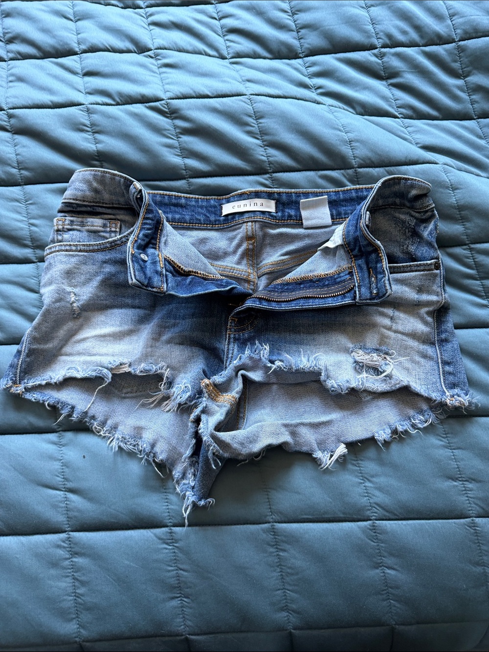 eunina Light Blue Distressed Denim Cutoff Shorts. Lulu high rise cut offs